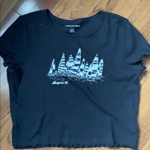 Black t-shirt with boats on the front